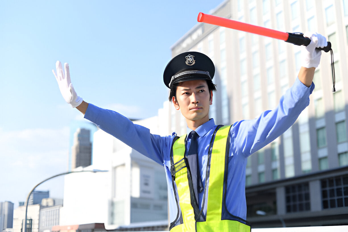 Stay Safe on the Job with Hi-Vis PPE for Construction Flaggers Directing Traffic Safely