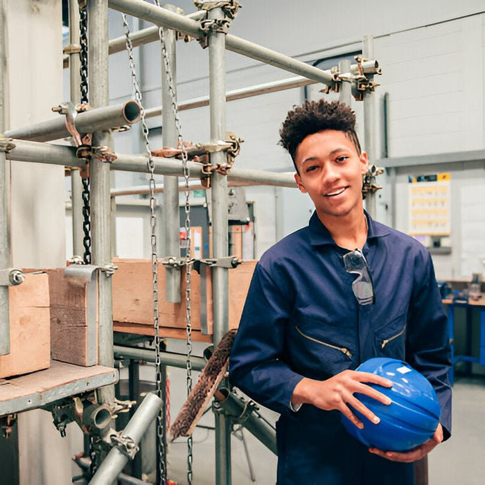 Why You Need to Know About Coveralls: The Ultimate Protection Against Chemical Splashes and Flames - Mann Supply