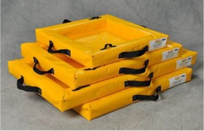 A yellow oil-only spill berm with hydrophobic properties, designed to contain hydrocarbon spills while allowing water to pass