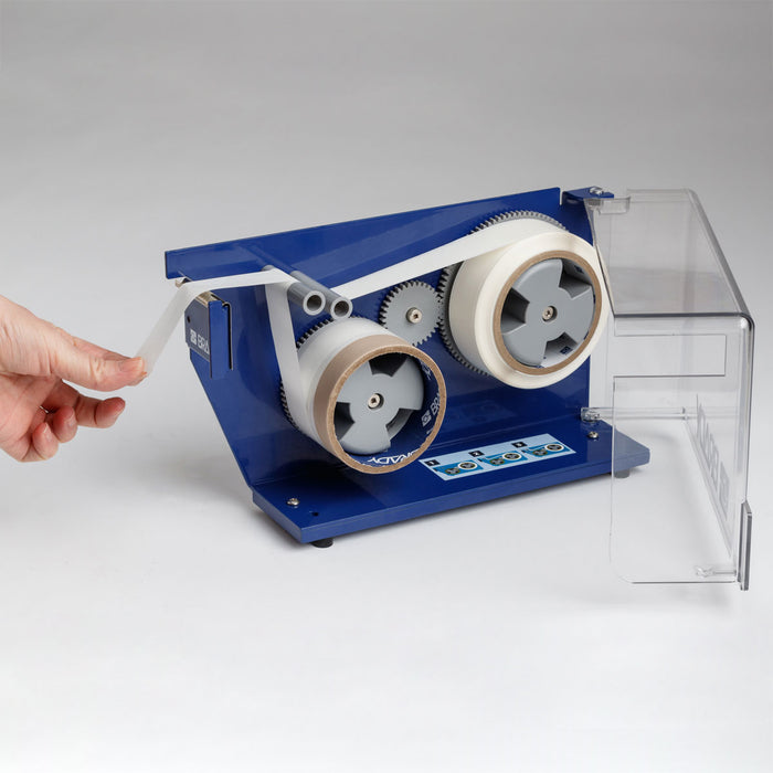 Continuous Material Dispenser with Liner Remover